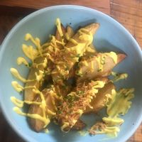 Potato wedges that come with the burger. at Teva in Rio De Janeiro