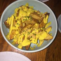 Cheesey potatoes with herbs at Teva in Rio De Janeiro