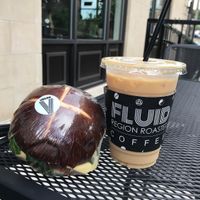 vegan seitan, cheese, lettuce and tomato sandwich with oat milk iced latte : ) at Fluid Coffeebar in Valparaiso