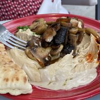 Wow! Meaty mushrooms and grilled onions on hummus. at Tal's Hummus in New Orleans