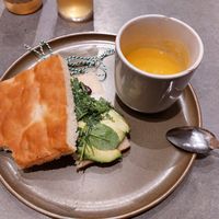 Already took a bite from the focacia and had a few teaspoons of soup. at The Sister in Brussels