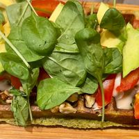 Vegan sunrise - 15 €
spinach & garlic inside, topped with mozzarisella “cheese”, tomato, avocado, walnuts, sprouted shoot at The Sister in Brussels