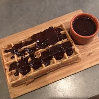 Vegan waffle with chocolate sauce at The Sister in Brussels