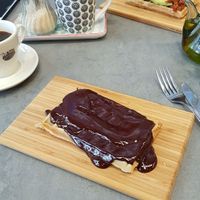 Waffle with chocolate and with vegan mozzarella, avocado and dried tomatoes at The Sister in Brussels