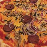 Mushrooms close up at Pizza Loft in Krakow