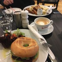 Ultimate vegan bagel, oat milk flat white and vegan french toast in the background 🤤 at Rose & Grant's in Glasgow