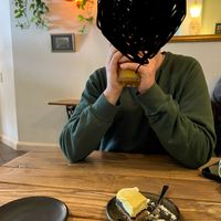 Zitrone-Mohn-Rohkostkuchen und warmer Sanddorn-Orangensaft mit Ingwer  at Marae - Kaffee & Zauberei in Luebeck