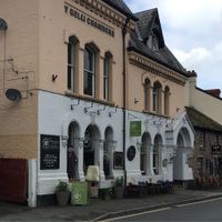 The old electric shop (white frontage) at The Old Electric Shop in Hay-on-wye