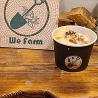 Ice cream with freshly chopped banana, nuts and dates on top at We Farm in Amman