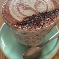 Red velvet latte with macadamia mylk   at Particle Cafe in Avondale Heights