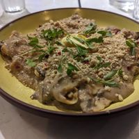 Mushroom sauce with pumpkin ravioli, with nut "parmesan" at Stem & Glory in Cambridge
