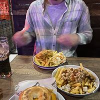 Spicy Fried ‘chicken’ bagel, poutine and fried ‘chicken’ and chips  at Bloc Bar Glasgow in Glasgow