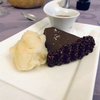 Sorbet pear ice, chocolate cake & salted caramel “butter”.  at Le Cheval Blanc  in Saint-antonin-noble-val