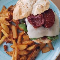 Burguer de lentejas, tonate seco, dulce de pimiento y queso vegan at Suka in Suances