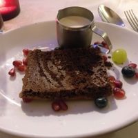 Chocolate and almond cake with soya cream at Otto's Restaurant in Sheffield