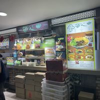 Go down the escalator and then turn right   at FIREFLY 萤火虫 by Thunder Tree in Central Singapore