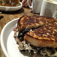 Mushroom toastie with house made vegan cashew cheese. Also contains hazelnuts, pickled onion and basil. So good! at KINES in Brunswick