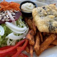 Tofu wrapped in seaweed and fried. Sides of green salad and yams fries and vegan tartar sauce    at Fish on Fifth in Sidney