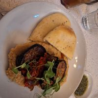 Vegan plate with walnuts and dressing on the side at Brother Hubbard - North in Dublin