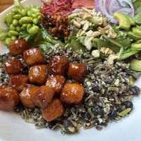 Tofu bowl (umami sauce is not vegan, but they had sriracha which was a great substitute.  Tofu marinade is vegan)   at Insula in Ely