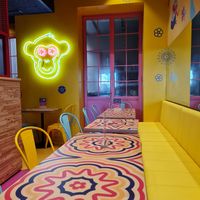 Inside tables at Flower Burger in Monza