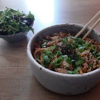 nudles with vegetables and side salad at Marukoshi in Belgrade