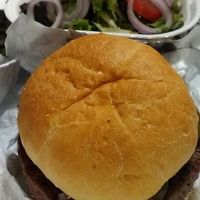 A vegan (Impossible) Build-Your-Own burger, with salad as a substitute side. Fall 2020. at Wild Flower Cafe in Red Hook
