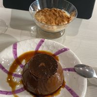 Flan algarroba y arroz con leche  at Natu in Santander