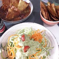 Beans and nachos. Raw carrot and courgette spaghetti with pesto. at Natu in Santander