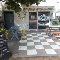 Front, opposite the football pitch  at Cafe Tropico in Taganga