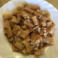 Rigatoni con pesto di pomodori secchi e mandorle  at In Pasta in Lucca