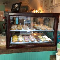 Case with donuts at Dun-Well Doughnuts in New York City