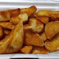 Spicy potato wedges at Sunrise Pita and Grill in Sunrise