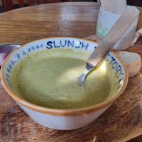 Broccoli and asparagus soup with ciabatta bread and pickles on the side. 9500kw at Slunch Factory - 슬런치 팩토리 in Seoul