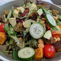 Real Food Mix salad with homemade croutons, chickpeas, olives, and other surprises like almond and sun dried tomatoes, with assorted veggies and dressing on side at Real Food 真食 - South Beach in Central Singapore