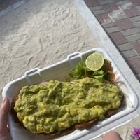 Avocado toast   at Eduardo's Beach Shack in Palm Beach