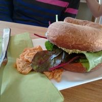 bagel with leaf, tomato, avocado & pesto at Simply Nood in Bridge Of Allan