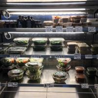 To-go case of prepared food items  at Meraki Juice Kitchen  in West Palm Beach