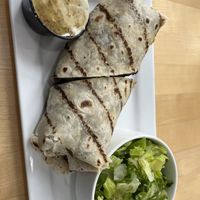 Veggie Burrito w/ Side Caesar Salad  at Meraki Juice Kitchen  in West Palm Beach