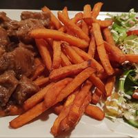 Flemish stew and sweet potato fries at De Plaats in Bruges