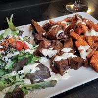 flemish stew with sweet potato fries at De Plaats in Bruges