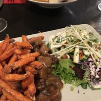 Seitan Flemish stew and chickpea stew with soy yoghurt at De Plaats in Bruges