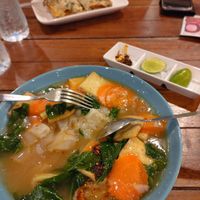 Flat rice noodles (lardna) and lasagna at Govinda's Restaurant in Krabi