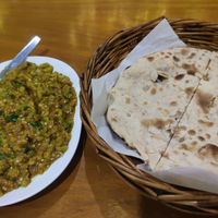Eggplant dish with nan bread at Govinda's Restaurant in Krabi