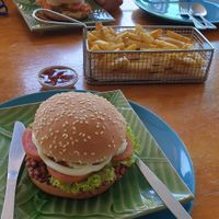 Soy burger (falafel burger in background) at Govinda's Restaurant in Krabi