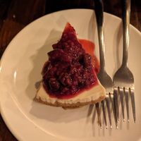 Cheesecake with berry sauce at Peekaboo Canyon Wood Fired Kitchen in Kanab