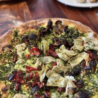 Pizza 1 with burnt tomatoe topping and dried out pesto  at Peekaboo Canyon Wood Fired Kitchen in Kanab