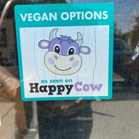 The happy cow sticker on the door! 💥  at Panda Chinese Restaurant in New Port Richey