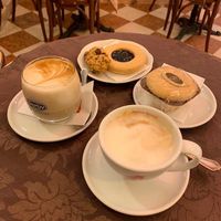 Biscotti, muffin, jam biscuit, latte and cappuccino at Pasticceria Ponte delle Paste in Venice