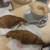 Pomegranate croissant and cappuccino  at Pasticceria Ponte delle Paste in Venice